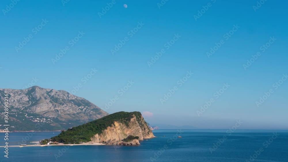 Timelapse St. Nikola island in Montenegro. Clear weather, boats in the sea Timelapse St. Nikola island in Montenegro. Clear weather, boats in the sea