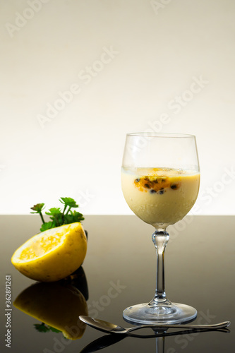 
passion fruit mousse served in a cup