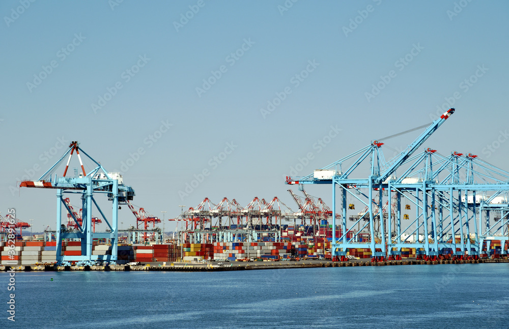 Newark, NJ / USA - View of the container terminal with gantry cranes and stored containers.  