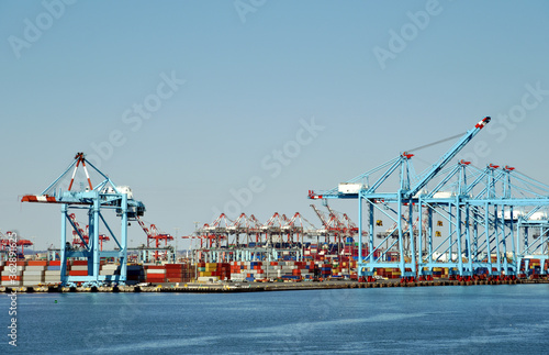 Newark, NJ / USA - View of the container terminal with gantry cranes and stored containers. 