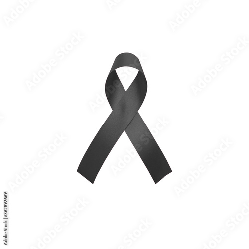 Black awareness ribbon isolated on white background for mourning, Sleep Apnea,Sleep Disorders,Primary Biliary Cholangitis, sad and symphathy concept. Melanoma and Skin Cancer Awareness Month