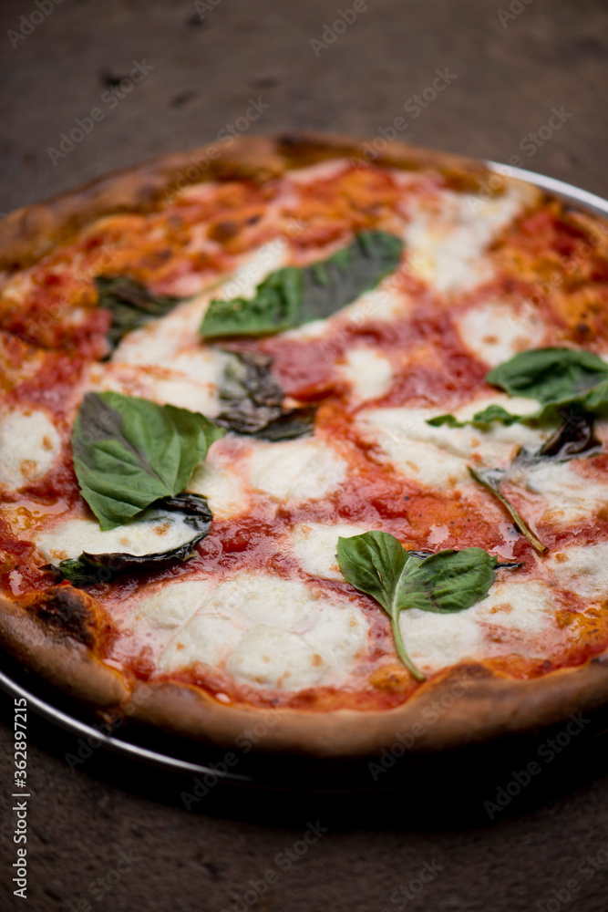Pizza. Traditional New York City style margarita pizza pie with a thin
