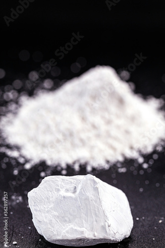 Kaolin or kaolin is an ore composed of hydrated aluminum silicates, such as kaolinite and haloisite photo