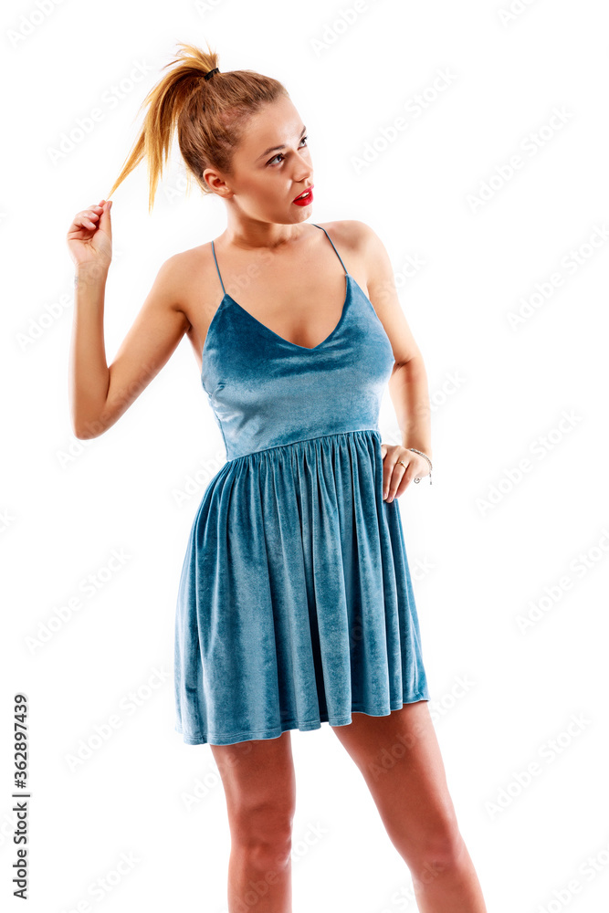 Fototapeta premium Young beautiful woman with fashion dress on white background