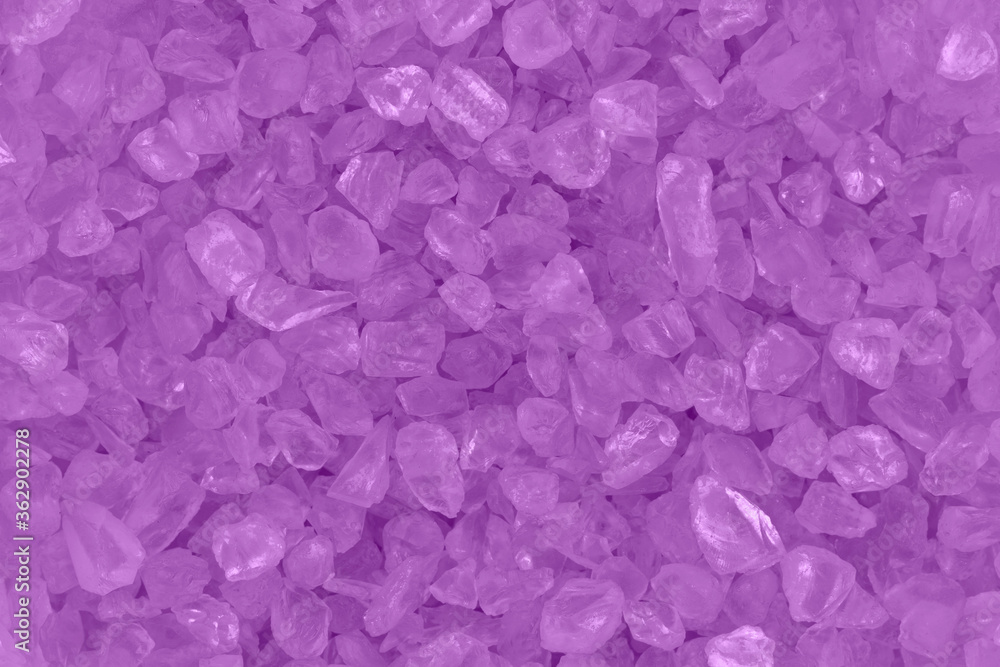 Purple textured beach glass closeup background