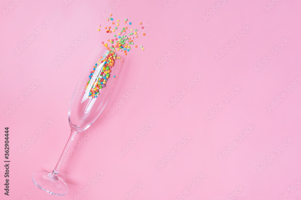 Cake confetti decorations in the champagne glass Cake confetti decorations in the champagne glass
