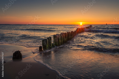 Obraz na płótnie Sunset on the Baltic Sea in Miedzyzdroje, Zachodniopomorskie, Poland w salonie