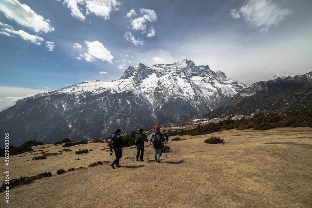 Hikers with Himalayan Mountains as background