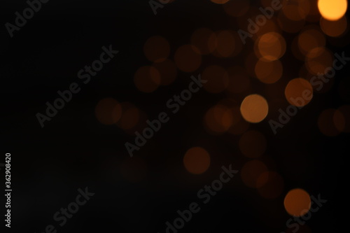 Gold abstract bokeh background, Festive xmas abstract background with bokeh defocused lights and stars