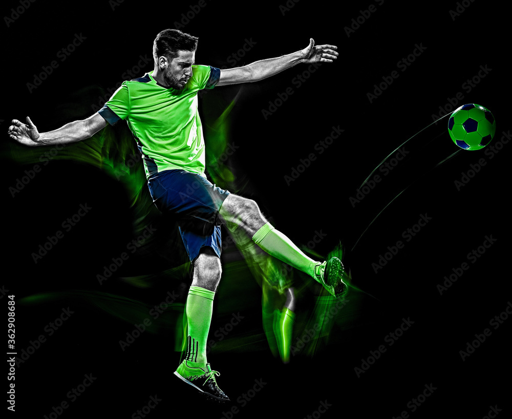 one caucasian soccer player man isolated on black background with light painting speed effect