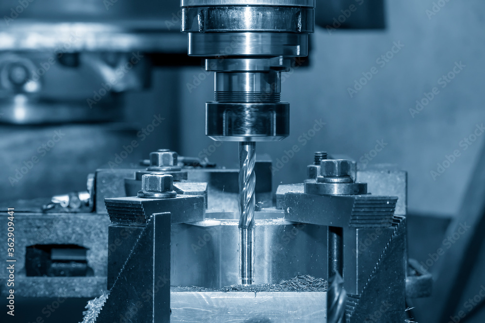 The milling machine make the hole on the work pieces by drill tools. The metal working process by milling machine. The milling machine make the hole on the work pieces by drill tools. The metal working process by milling machine.