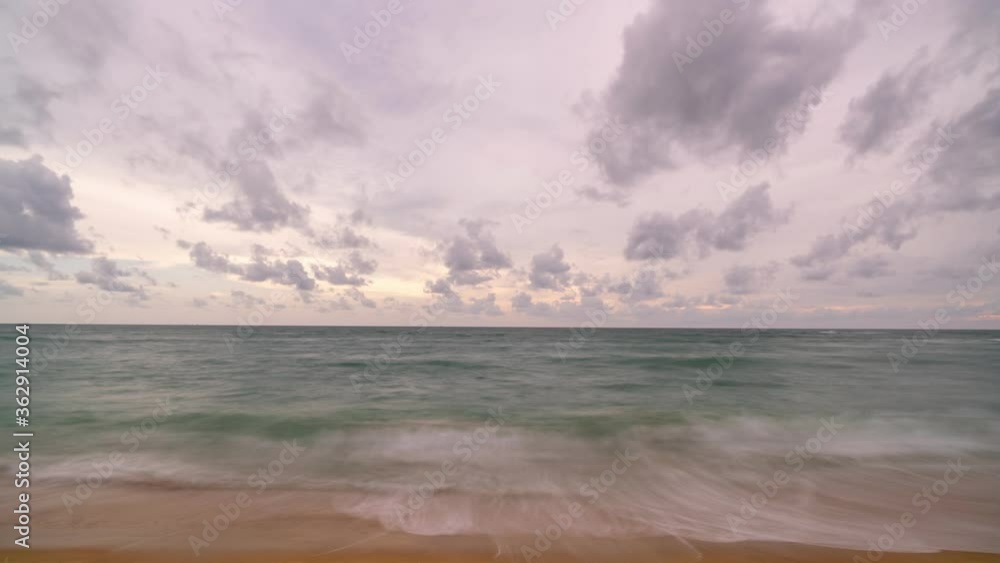 Time lapse tropical beach and sea with clouds flowing in the sky Time lapse tropical beach and sea with clouds flowing in the sky