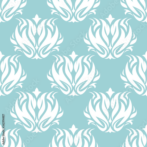 Floral seamless background. White pattern on blue backdrop © Liudmyla