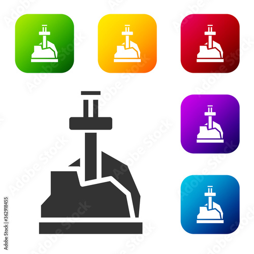 Black Sword in the stone icon isolated on white background. Excalibur the sword in the stone from the Arthurian legends. Set icons in color square buttons. Vector.