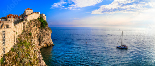 Fototapeta Naklejka Na Ścianę i Meble -  Croatia travel. ancient Dubrovnik town. Popular tourist and cruise destination. view of fortified wall and castle