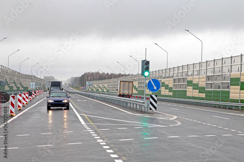 Highway, road markings and road signs.