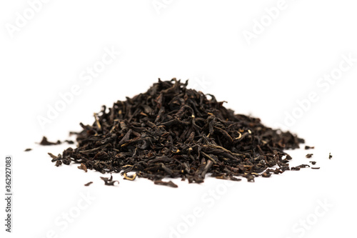 Leaves of black premium dry tea on a white background