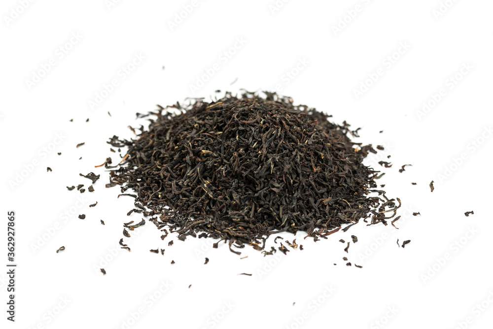 Leaves of black premium dry tea on a white background Leaves of black premium dry tea on a white background