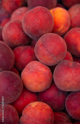 fruits peaches. Texture background of sweet red ripe peaches. vegetarian food fruit peaches.
