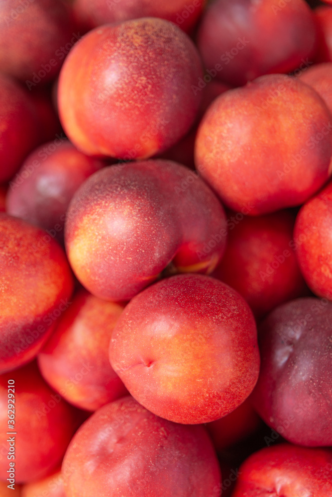 Peaches fruit close-up. background of ripe red peaches. Fruit Peaches. Food Image. Necktarines. Peaches fruit close-up. background of ripe red peaches. Fruit Peaches. Food Image. Necktarines.