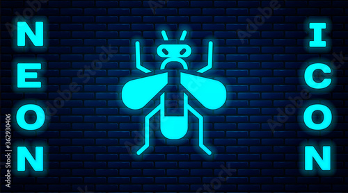 Glowing neon Insect fly icon isolated on brick wall background. Vector.