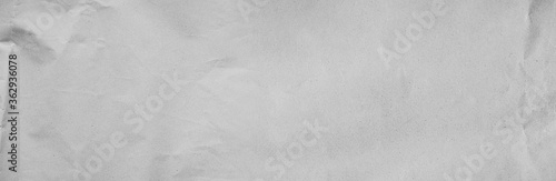 Table top back panoramic gray line draw paper kraft background texture in soft white light color concept for page wide screen wallpaper design, flat rice grey surface for panoramic wall. plain cement