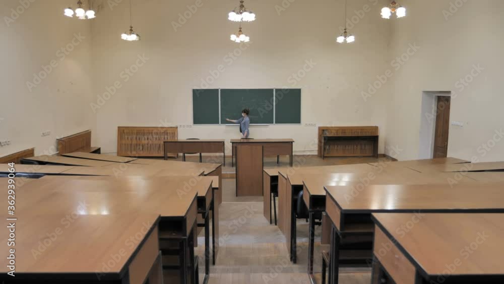 Female Lecturer Gives An Online Lesson Teaching Students. Online Education. Female Lecturer Gives An Online Lesson Teaching Students. Online Education.