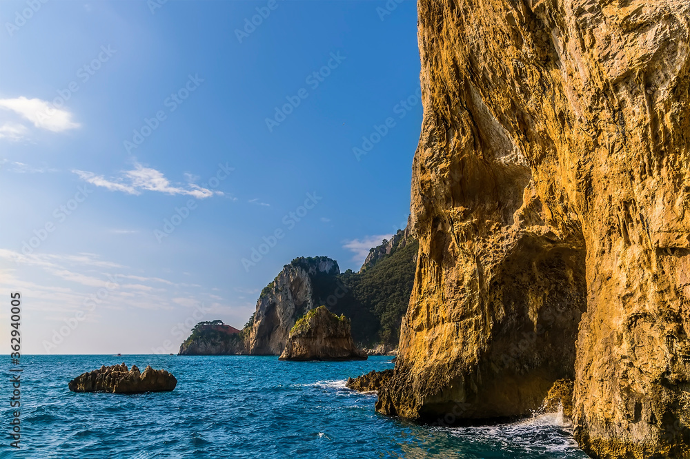 Fototapeta premium Cliffs and sea stacks along the east coast of the Island of Capri, Italy