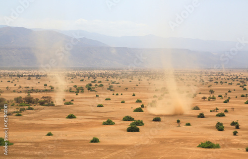 Aerial view of dust devils in Shompole conservancy area in the Great Rift Valley, near Lake Magadi, Kenya.