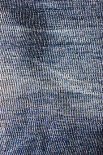 Denim jeans vertical banner background. Empty blue jean fabric texture, blank casual pants design. Denim jeans material surface, trendy fabric texture of denim pants