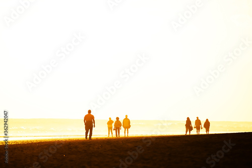 Sunset walk on Playa del Ingles in Gran Canaria  Spain  Europe