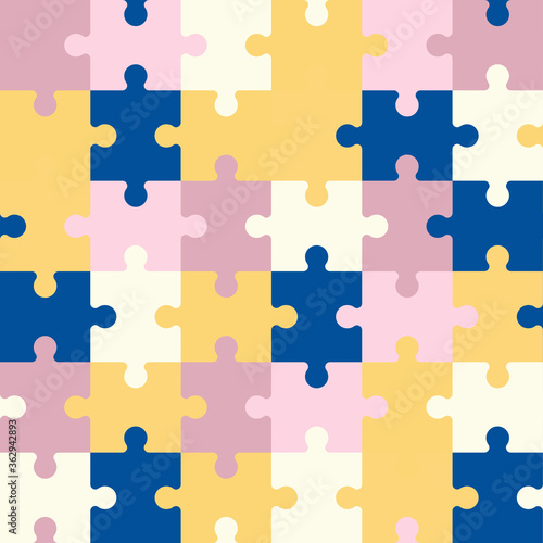 Vector seamless pattern of colorful jigsaw puzzle pieces.