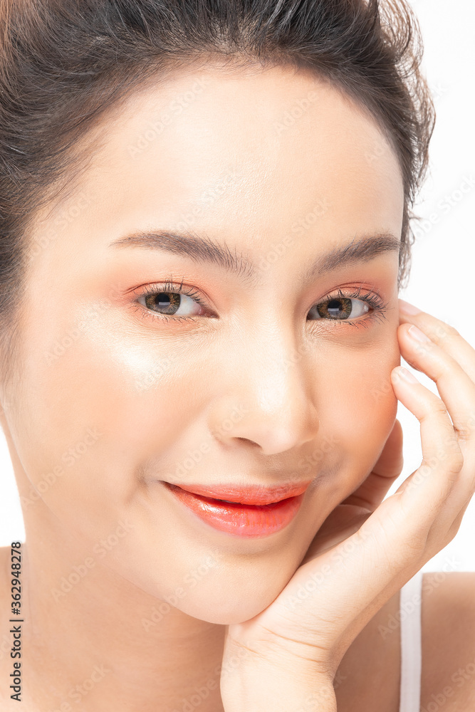 Beautiful Asian woman looking at camera smile with clean fresh skin Beautiful Asian woman looking at camera smile with clean fresh skin