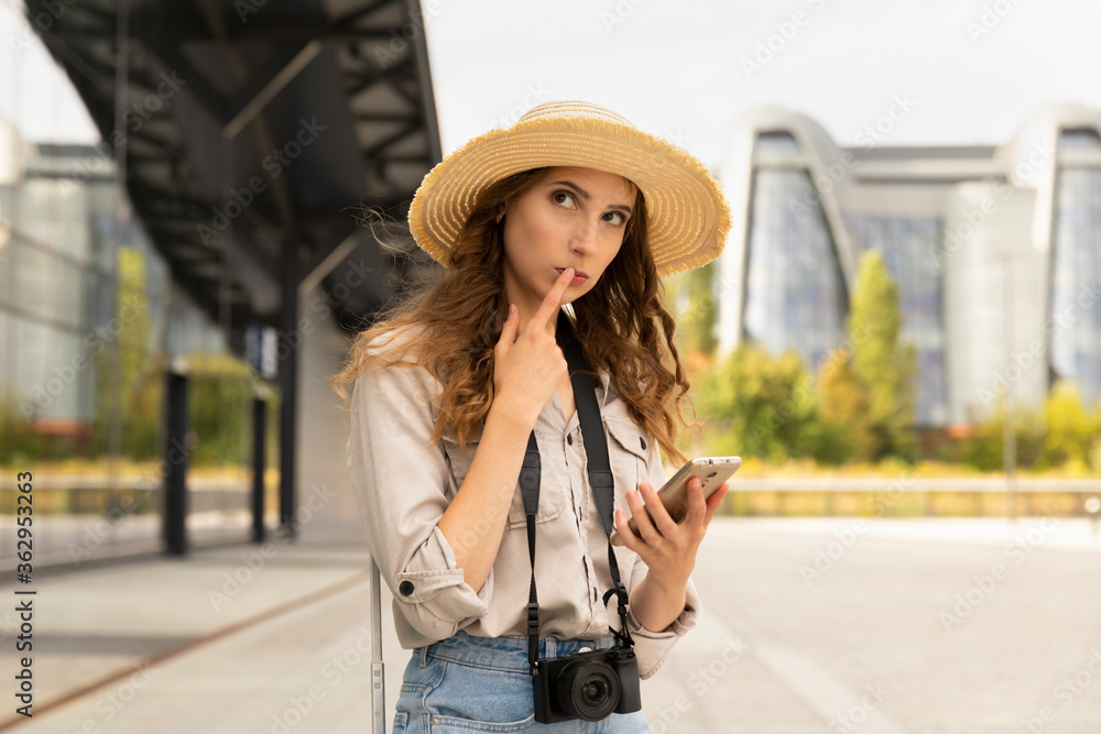 Image of excited young pretty woman tourist posing.