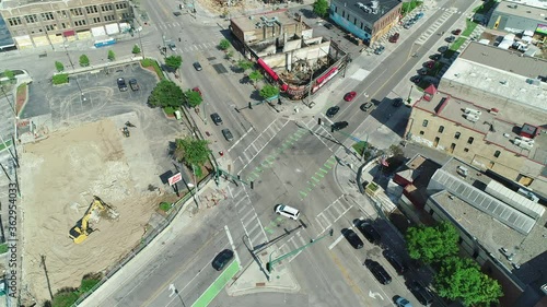 Drone aerial of a liquor store, Autozone and police department in Minneapolis damaged or burned down in June 2020 amid Black Lives Matter protests photo