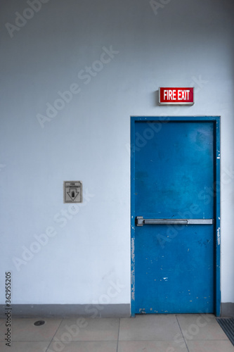 Bright Fire Exit and Blue Door