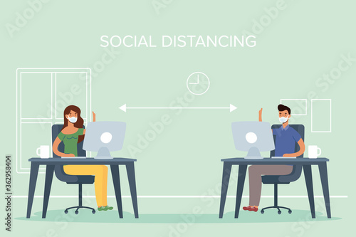 young couple wearing medical masks and social distancing in workplace