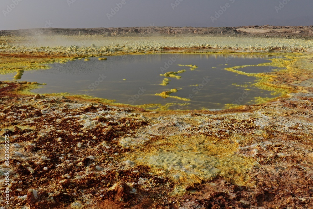 Salt ponds, bubbling chimneys and salt terraces form the bottom of the volcanic crater Dallol, Ethiopia: The Hottest Place on Earth,Danakil Depression.North Ethiopia,Africa Salt ponds, bubbling chimneys and salt terraces form the bottom of the volcanic crater Dallol, Ethiopia: The Hottest Place on Earth,Danakil Depression.North Ethiopia,Africa