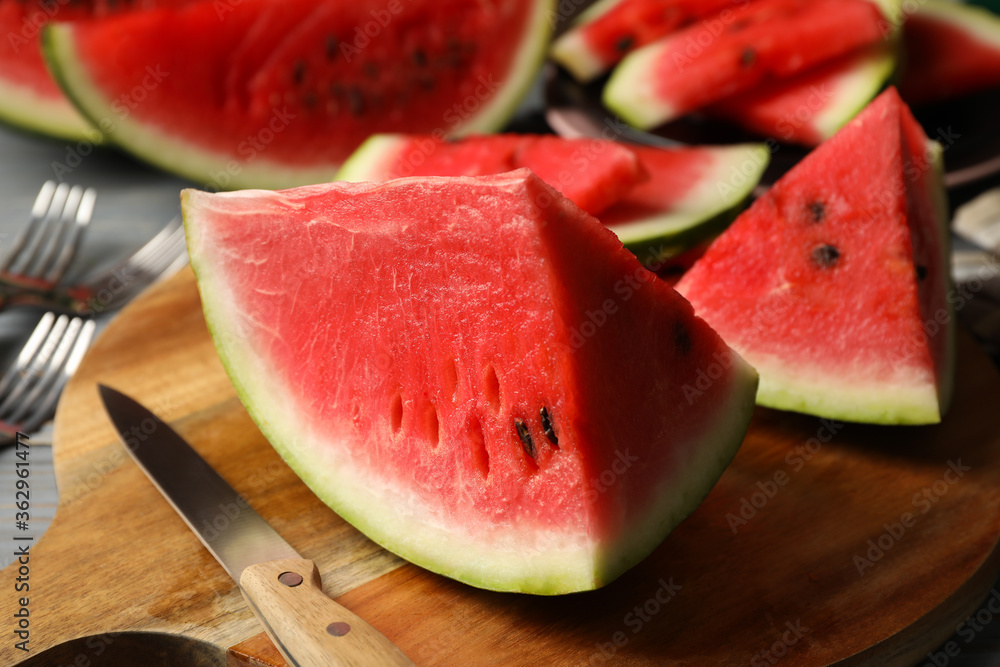 Composition with watermelon slices on gray wooden table. Summer fruit Composition with watermelon slices on gray wooden table. Summer fruit