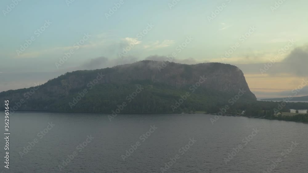 Moosehead lake golden hour sunrise fog lingers over Mount Kineo Moosehead lake golden hour sunrise fog lingers over Mount Kineo