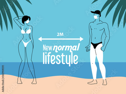 Young couple keeps distance on the beach