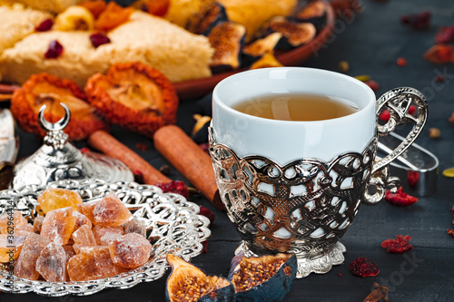 Close up photo of turkish national desserts with cup of coffee