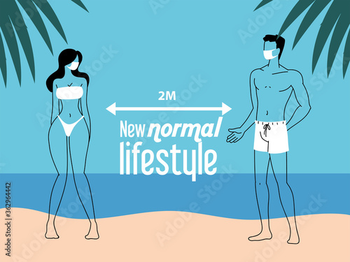Young couple keeps distance on the beach