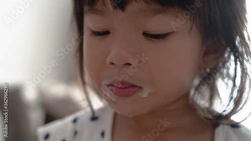 Little Girl Playing Ice Cream At Home photo