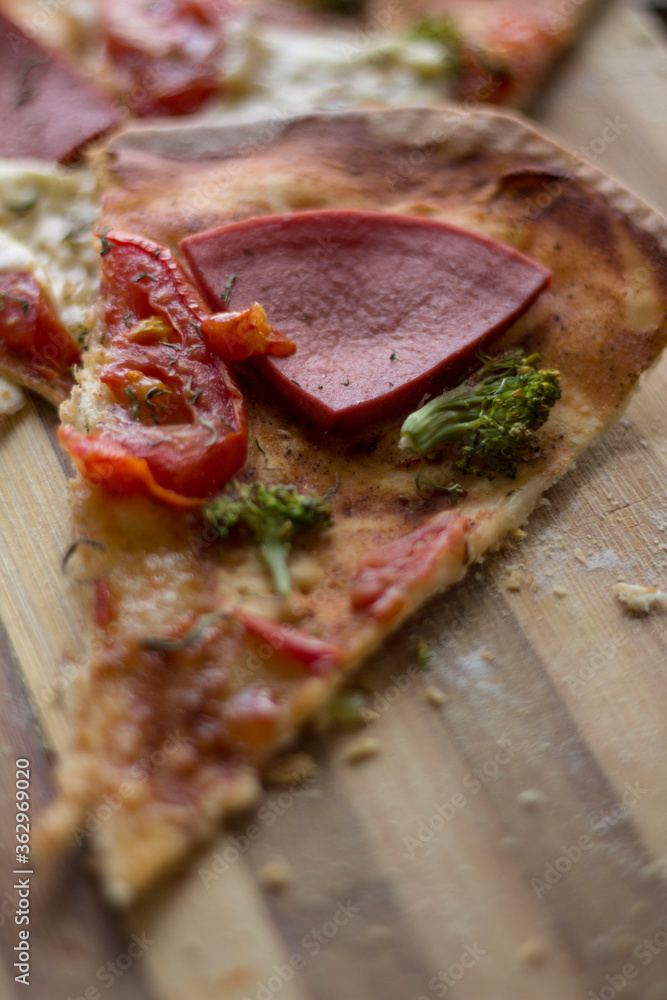 pizza with ham tomato cheese and broccoli pizza with ham tomato cheese and broccoli