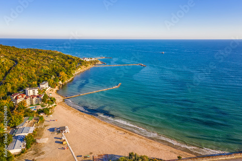A beautiful aerial view from drone to coastline with bay and beach © EdVal