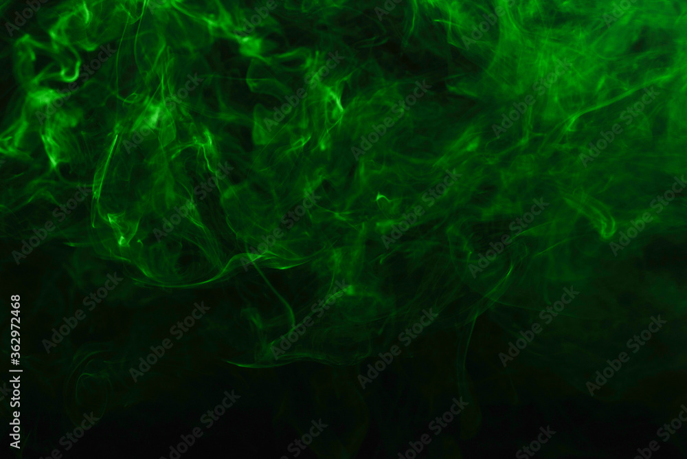 Green steam on a black background. Green steam on a black background.