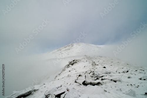 A foggy winter day looking at the summit of Mount Washington in New Hampshire.