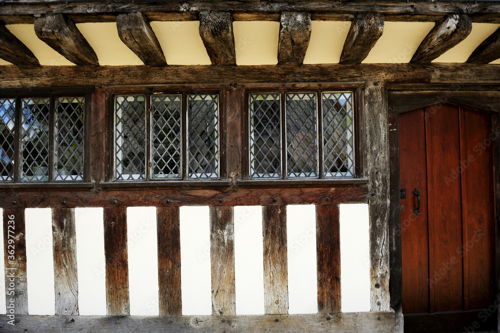 Wall and building typical Tudor English style in Stratford Upon Avon, England, UK Wall and building typical Tudor English style in Stratford Upon Avon, England, UK