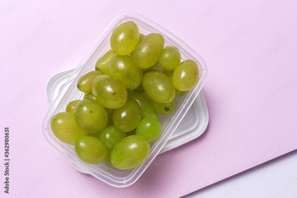 Fresh seasonal grapes in Plastic containers ready to eat To take away Fresh seasonal grapes in Plastic containers ready to eat To take away